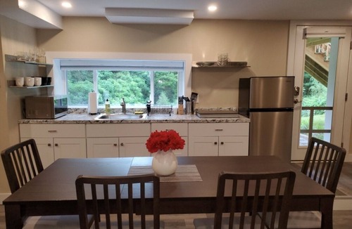 Lenox House | Family friendly house with two complete units, private deck and yard.