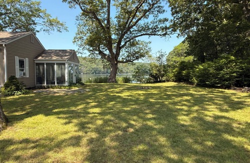 Saunderstown House | Family friendly WATERFRONT home with private beach.