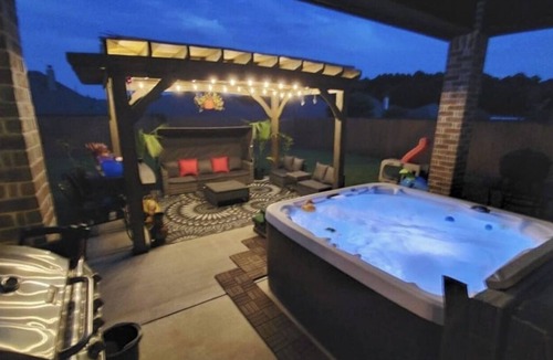 Tyler House | Family Fun 3BR Getaway with Hot Tub and Play Yard