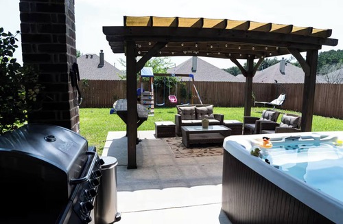 Tyler House | Family Fun 3BR Getaway with Hot Tub and Play Yard