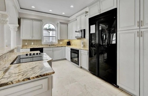 Crystal Shores House | Family fun by the beach! 5500 sq ft with 5 BRs, 5 baths, game room, heated pool