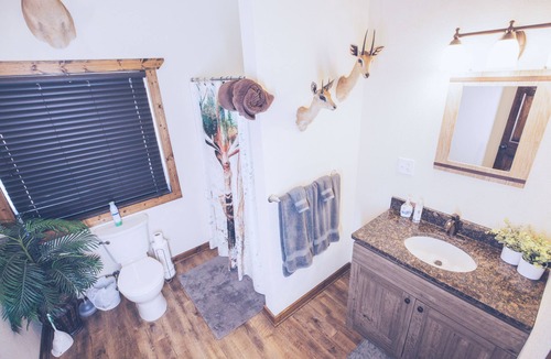 Clay Center Cabin | Family/Group sized area 4000 sq ' with large entertaining room with fireplace!