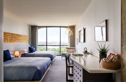 Congress Avenue Historic District Hotel | Family Haven, Poolside Bliss, Austin Serenity Awaits, Pets Stay For Free!