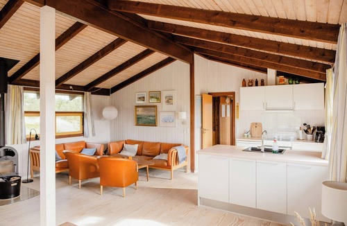 Slette Strand House | Family home in heather-clad landscape