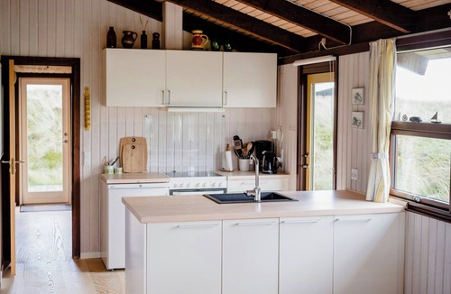 Slette Strand House | Family home in heather-clad landscape