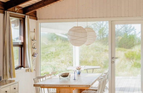 Slette Strand House | Family home in heather-clad landscape