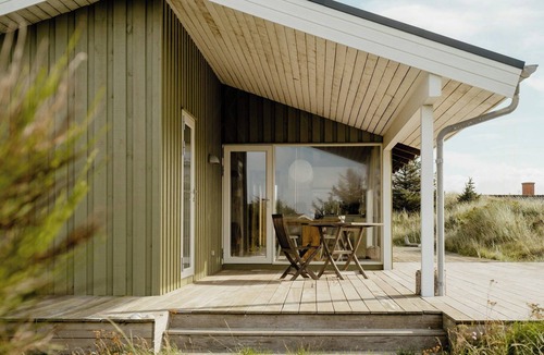 Slette Strand House | Family home in heather-clad landscape