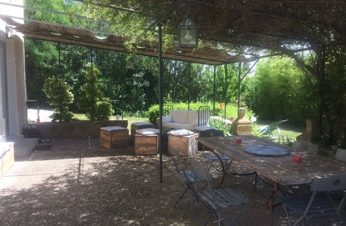 Ecusson House | Family home with character in a quiet, wooded setting.