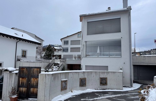 Grisons Apartment | Family oasis with garden and fireplace