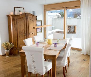Grisons Apartment | Family oasis with garden and fireplace