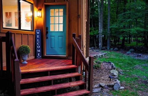 East Stroudsburg Ski Chalet | Family Pocono Retreat Stream Pool Firepit AC WiFi
