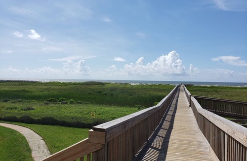 Red Fish Cove Condo | Family sized Condo with bay views AND gulf views. Short walk to the beach!