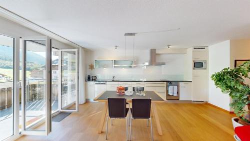 Lenz Apartment | Family ski oasis with mountain view