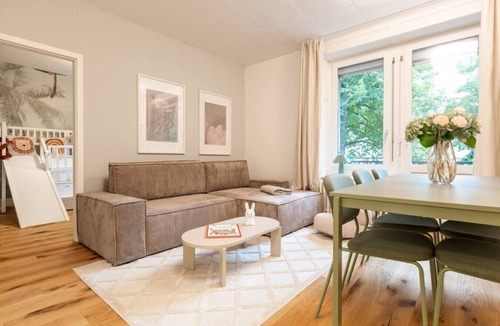 District 6 Apartment | Family Suite · Familienwohnung mit Rutsche