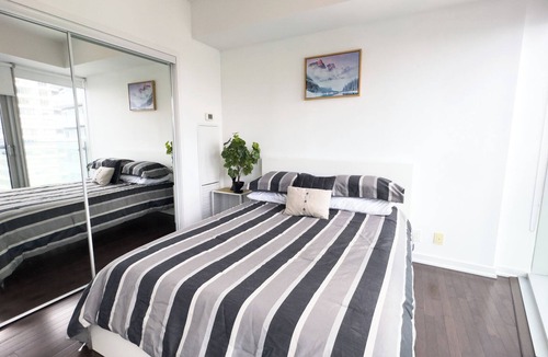 Central Waterfront House | Fancy 2 Beds Suite near CN Tower, Scotia Arena, Rogers Centre & FREE PARKING