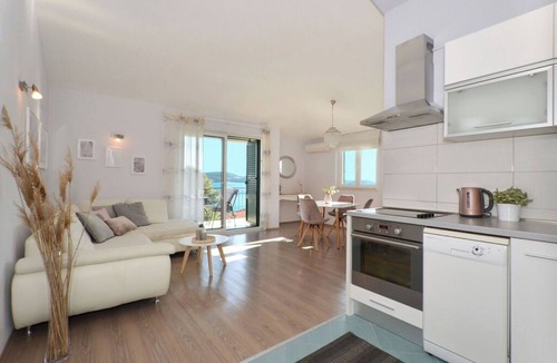 Seget Donji Apartment | Fantastic beachfront apartment with private balcony on the Adriatic.Top location