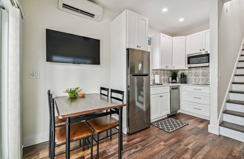 Dunedin House | Farm House Tiny Home on Pinellas Trail w/Heated Pool! Walk or Bike to Downtown Dunedin!