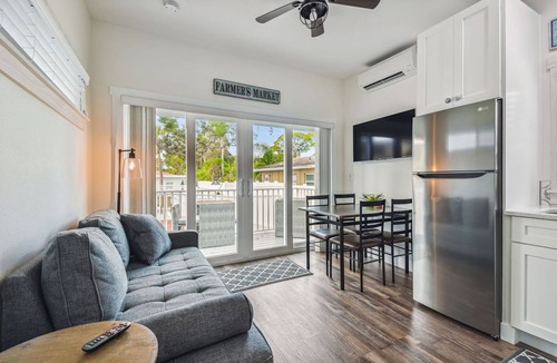 Dunedin House | Farm House Tiny Home on Pinellas Trail w/Heated Pool! Walk or Bike to Downtown Dunedin!
