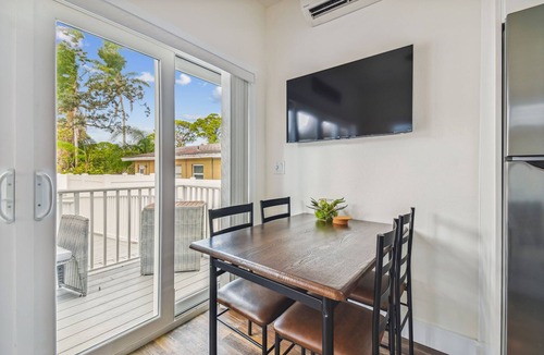 Dunedin House | Farm House Tiny Home on Pinellas Trail w/Heated Pool! Walk or Bike to Downtown Dunedin!