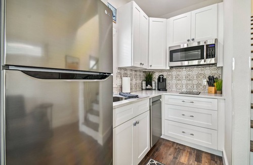Dunedin House | Farm House Tiny Home on Pinellas Trail w/Heated Pool! Walk or Bike to Downtown Dunedin!