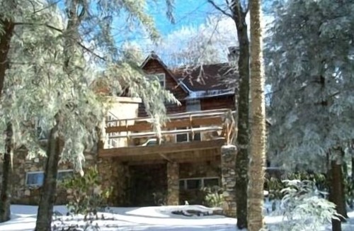 Charter Hills House | FIELDSTONE AND LOG HOME ON BEECH. nSki season dates available at 2024 prices!