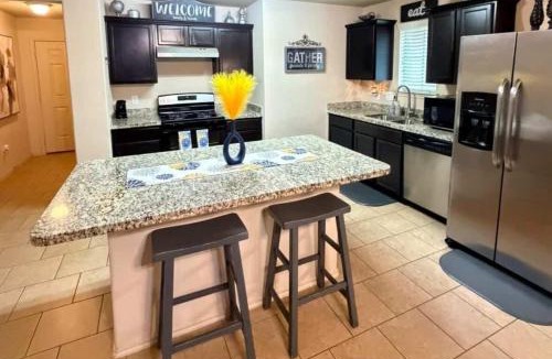 Porter House | FIFA World Cup Retreat Cozy Modern Home Covered Patio With TV