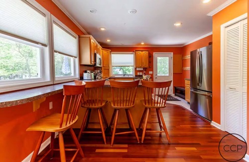 Montague Cottage | Firepit, Deck & Views | Stairs to Lake Michigan