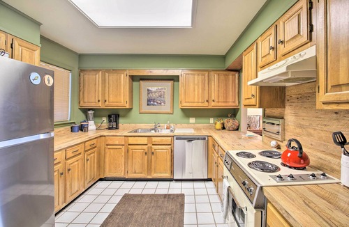 Mid America Condo | Fireplace, Pool Access: Waterfront Hot Springs Gem