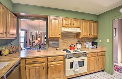 Mid America Condo | Fireplace, Pool Access: Waterfront Hot Springs Gem