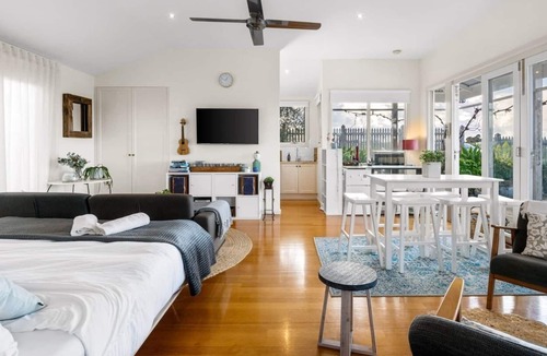 Bellbrae Apartment | Fireside Bliss Poolside Escape with Cosy Comforts