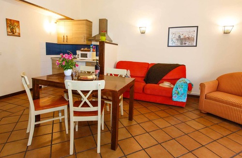Robregordo Apartment | First floor bedroom and fireplace duplex