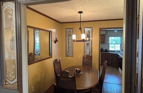 Hornbeak House | Fish cleaning station, screened porch, covered front porch, fire pit, 3 BR