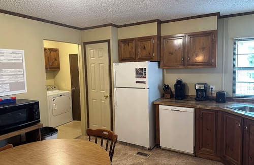 Hornbeak House | Fish cleaning station, screened porch, covered front porch, fire pit, 3 BR