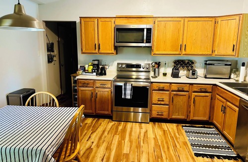 Fishers House | Fishers Getaway Hot Tub Walk to Dining Pets Welcome