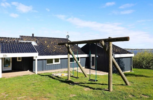 Hjarbæk House | Five-Bedroom Holiday home in Løgstrup