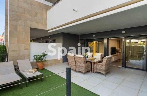 Playa Flamenca Apartment | Flamenca village Swimming Pool views 2 bedroom ground floor with garden