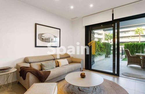 Playa Flamenca Apartment | Flamenca village Swimming Pool views 2 bedroom ground floor with garden