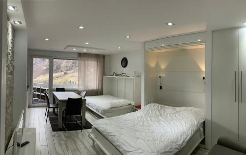 Leukerbad Apartment | Flaminia Wohnung 15 - Best view and Free parking!