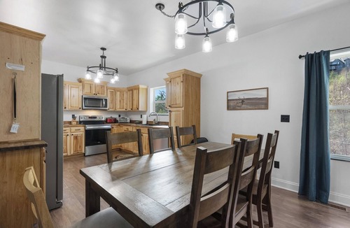 Chalet Village North Cabin | Flat 4bedrm Chalet Village with outdor spaces, 2 picnic tables,firepit,kids area