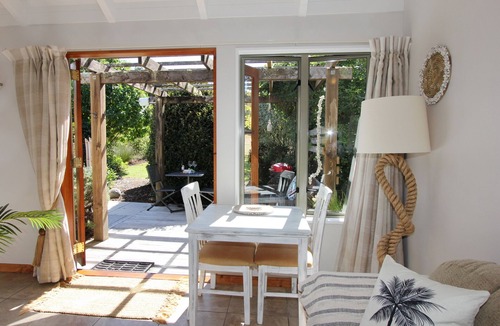 Cooks Beach Cottage | Flaxhaven Lodge private garden setting