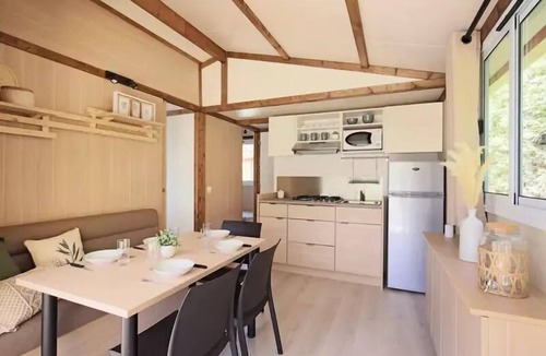 Laurac-en-Vivarais Ski Chalet | Flower Camping Saint Amand * - Chalet Premium 37m2 including 12m2 terrace (5p-2ch), Clim, TV, dishwasher, plancha, Nespresso 5 people