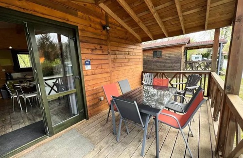 Leval Ski Chalet | Flower Camping du Lac de la Seigneurie * - Chalet Savania PREMIUM46 34 m2 (2 bedrooms) + covered terrace of 13 m2 + TV + reversible air conditioning 6 people