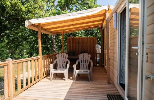 Champel House | Flower Camping Mas de Champel * - Mobile-Home 30m2 - Comfort - 2 bedrooms - Terrace semi-covered - TV - Clim 5 persons