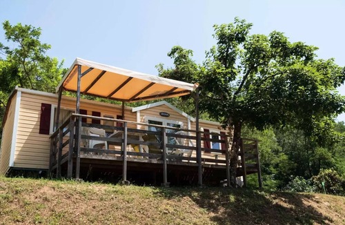 Champel House | Flower Camping Mas de Champel * - Mobile-Home 30m2 - Comfort - 2 bedrooms - Terrace semi-covered - TV - Clim 5 persons