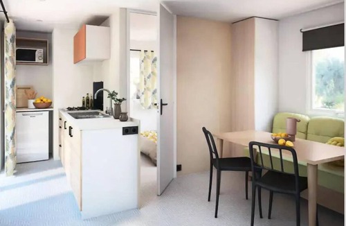 Champel House | Flower Camping Mas de Champel * - Mobile-Home 30m2 Premium - 2 bedrooms - Covered terrace - CLIM + TV + sheets + towels included 4 people