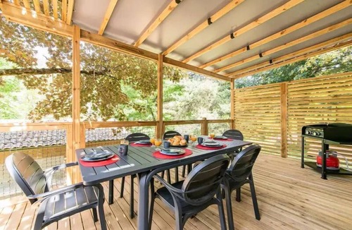 Champel House | Flower Camping Mas de Champel * - Mobile-Home 30m2 Premium - 2 bedrooms - Covered terrace - CLIM + TV + sheets + towels included 4 people