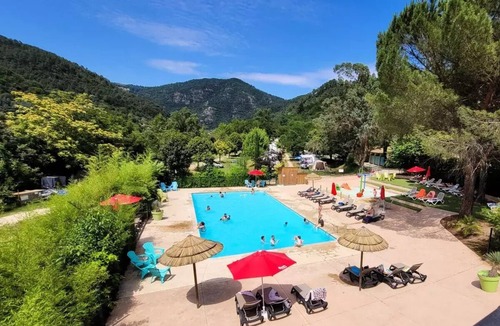 La Combe House | Flower Camping Mas de Champel * - Mobile-Home 30m2 - Standard - 2 bedrooms - semi-covered terrace - TV - Clim 4 people