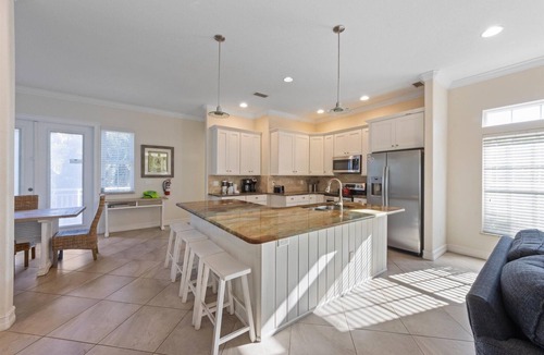 Holmes Beach House | For Shore: Sleeps 10, steps to beach, heated pool!