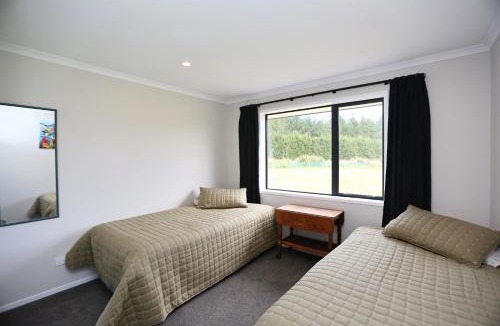 Waitarere Beach House | Forest Charm by the Beach