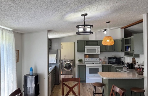 Henderson County House | Forget your worries in this spacious and serene space.